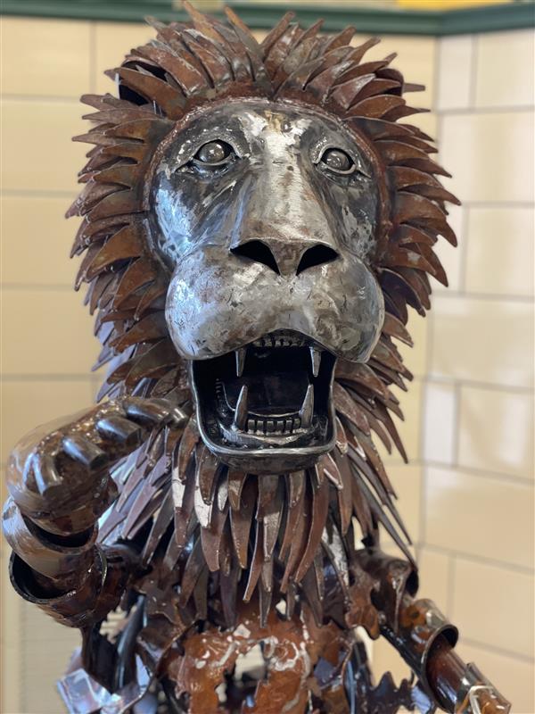 Close up view of the lion sculpture's face